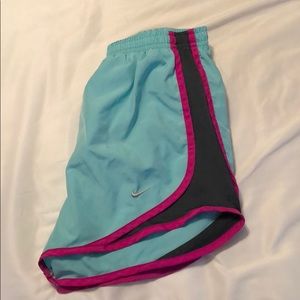 Blue Nike Shorts With Pink & Gray Detailing